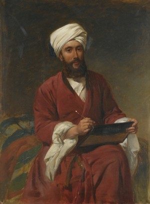 An Oriental man writing